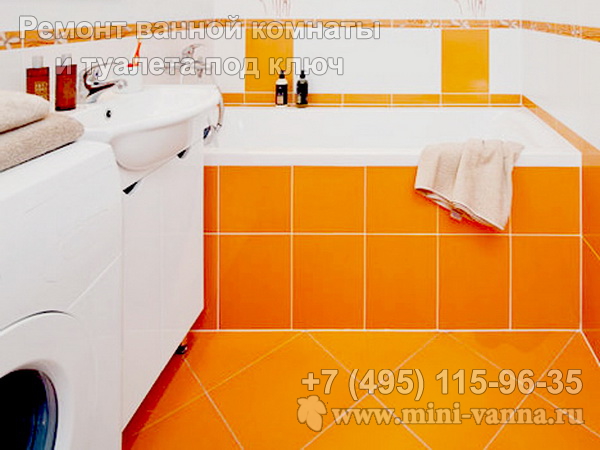 Оранжевая ванная комната со стиральной машинкой устроенной рядом с раковиной